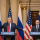 President Donald Trump, left, and Russian President Vladimir Putin answer questions about the 2016 U.S Election collusion during a joint press conference after their summit on July 16, 2018 in Helsinki, Finland.